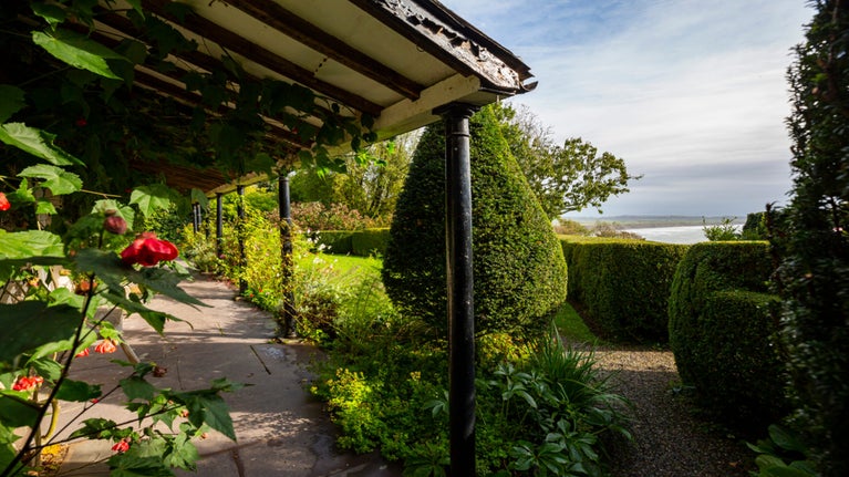 Coastal views from the garden at Plas yn Rhiw, Gwynedd